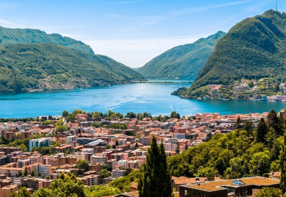 Landscape of Lugano lake, mountains and the city