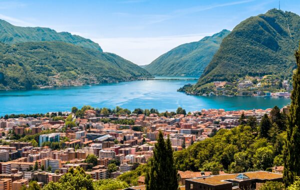 Landscape of Lugano lake, mountains and the city