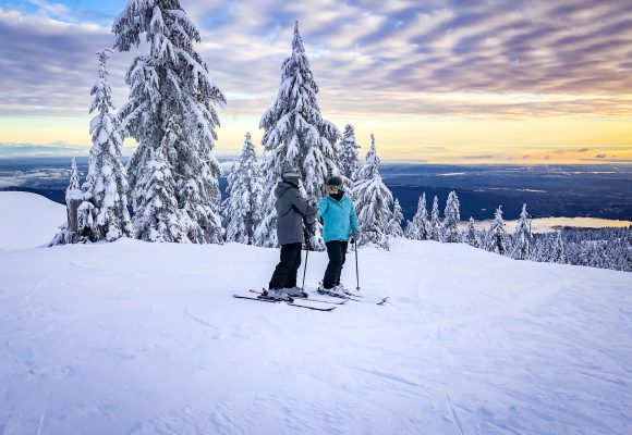 Sking with Mt. Seymour in the City of Vancouver in the background
