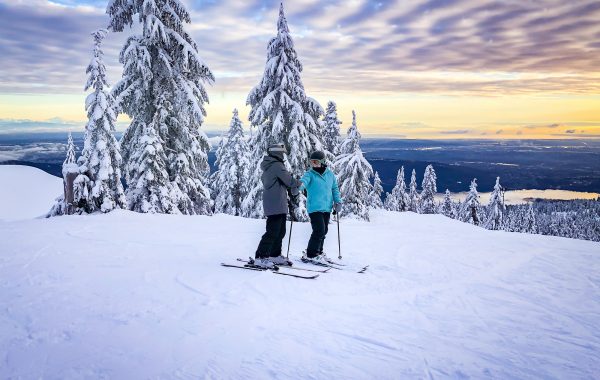 Sking with Mt. Seymour in the City of Vancouver in the background
