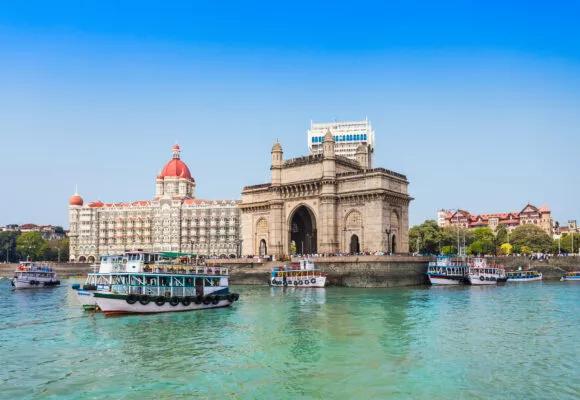 The Gateway of India and boats as seen from the Mumbai Harbour in Mumbai, India