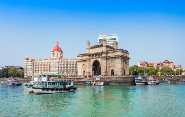 The Gateway of India and boats as seen from the Mumbai Harbour in Mumbai, India