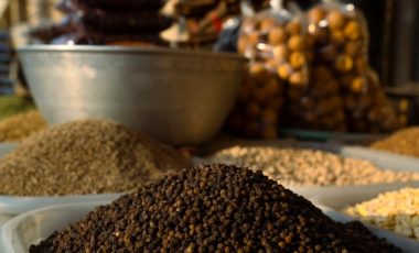 Close up of peppercorns on sale at a souq