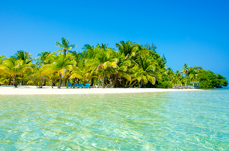 Bild från strand på ön South Water Caye i Belize